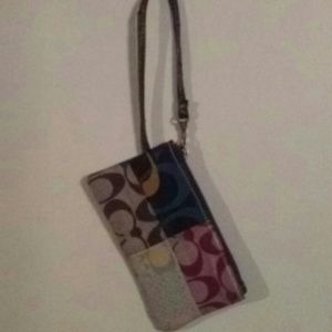 Patchwork coach wristlet